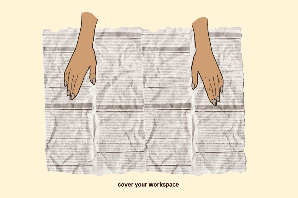 Cover your workspace with newspaper