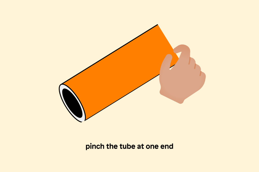 Pinch the tube at one end