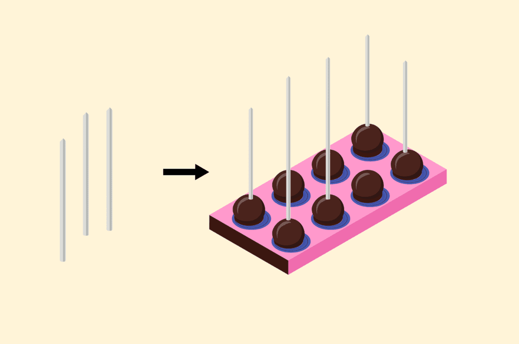 3 insert the lollipop sticks into the chocolate